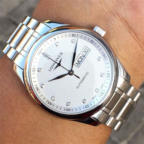 how to spot a fake longines conquest watch|longines conquest quartz 39mm.